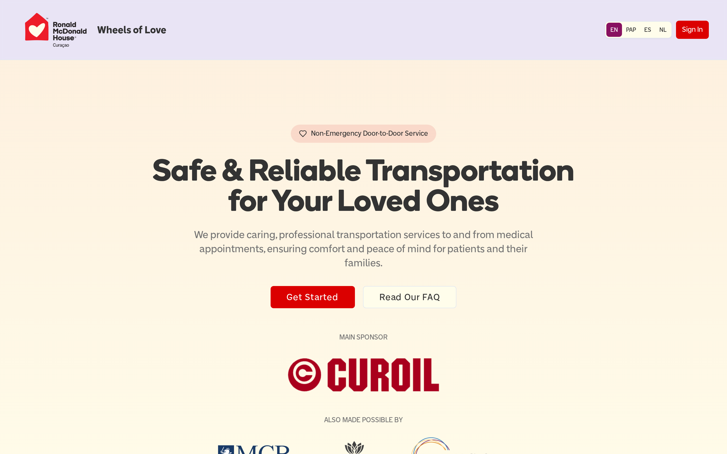 Wheels of Love transport platform with ride request and dispatch views shown on a laptop